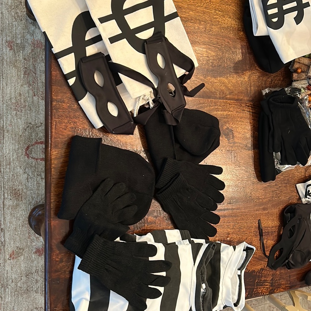 Couples burglar costumes . Shirts large
